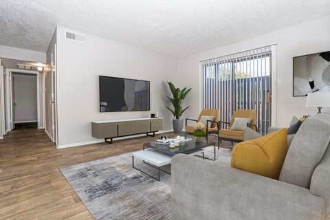 Dakota apartment living room with large windows