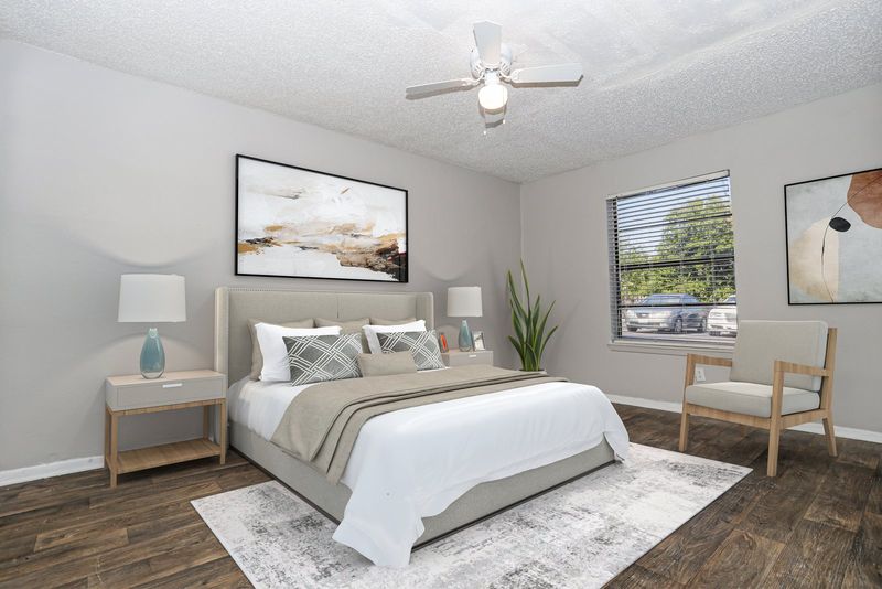 Dakota apartment bedroom with a large window